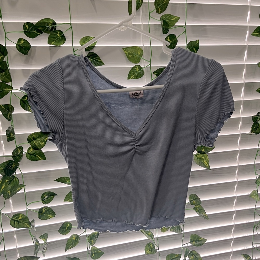 a blue top from tillys